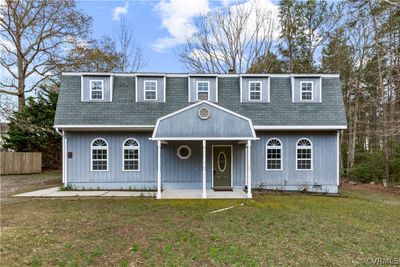 View of front facade featuring a front lawn | Image 2