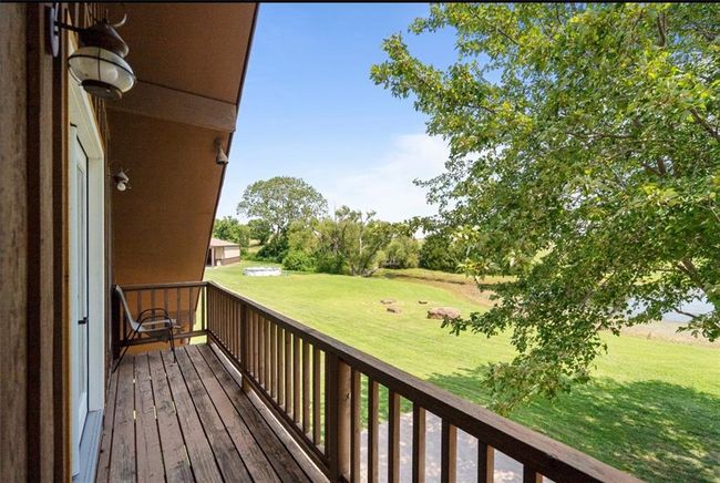 Wooden deck with a yard | Image 22