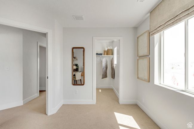 Unfurnished room with light colored carpet | Image 16