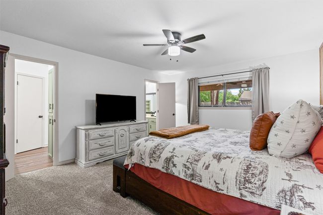 Bedroom featuring carpet and a ceiling fan | Image 15