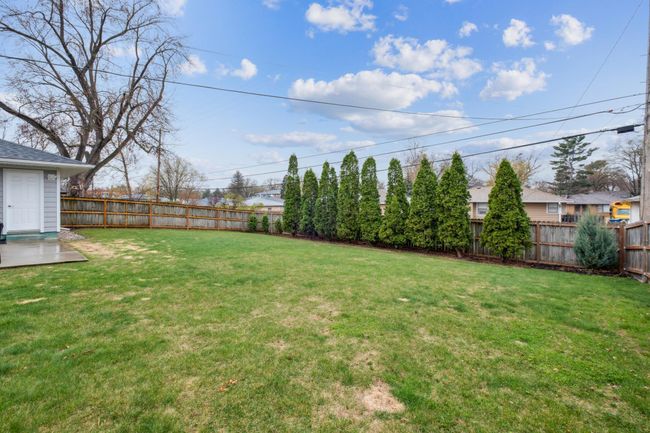 Backyard w/ 6' wood privacy fence | Image 22