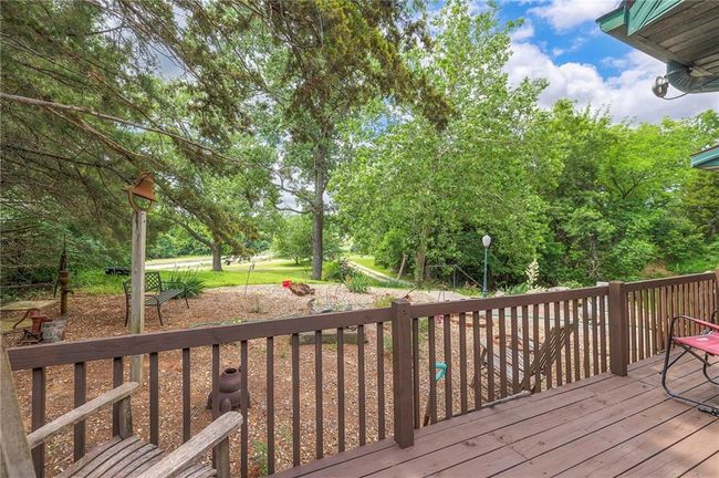 Wooden terrace with view of scattered trees | Image 44