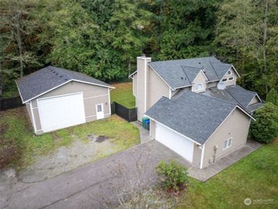 Home with 2 car attached garage PLUS a detached garage that will house a large RV and still have room for an office and shop. | Image 3