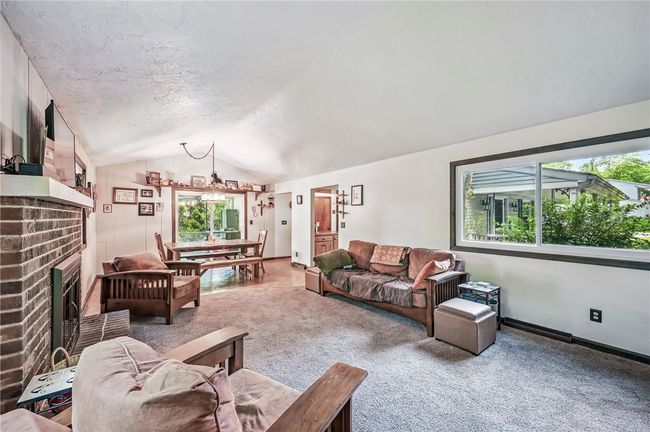 Open-concept living and dining, perfect for family and friends. | Image 8