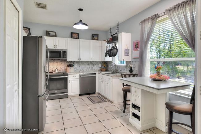 34852 Teeview Ln, Townhouse with 3 bedrooms, 3 bathrooms and null parking in ZEPHYRHILLS FL | Image 13