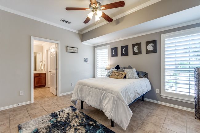 Primary bedroom with ensuite bath and walk-in closet | Image 10