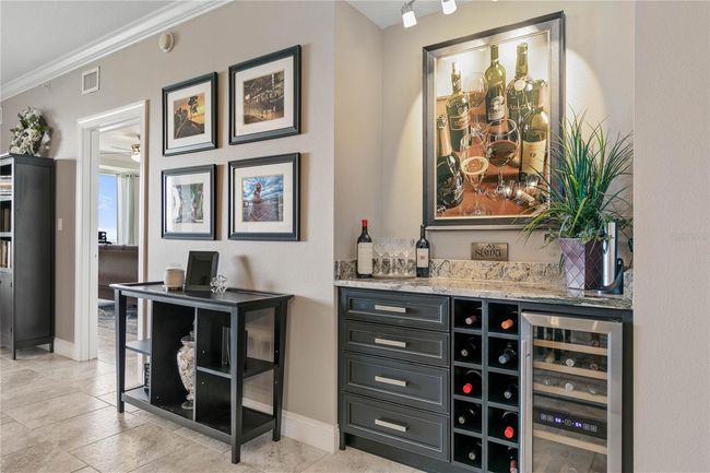 Beautiful built in Bar w Wine Cooler and lighting | Image 25