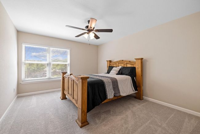 Recent carpet and fresh paint give these rooms a clean and updated appearance. | Image 29
