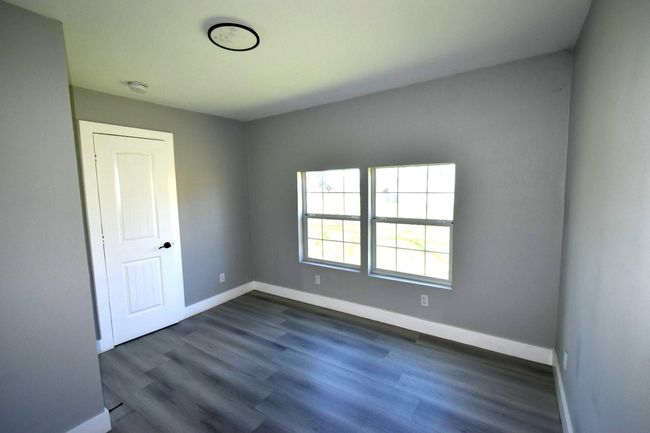 I'm sorry, but it looks like the image is not of a secondary bedroom. Could you describe or provide an image of the bedroom you’d like help with? | Image 19