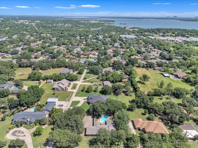 Aerial view of residential area with a nearby body of water | Image 36