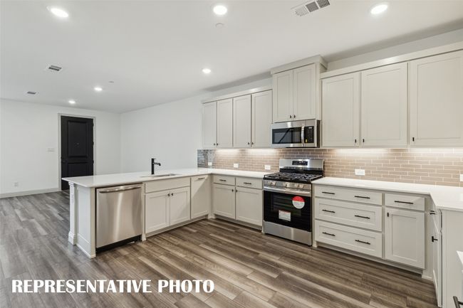 Featuring a great open concept design, entertaining is a breeze in our Boyd floor plan. REPRESENTATIVE PHOTO | Image 7