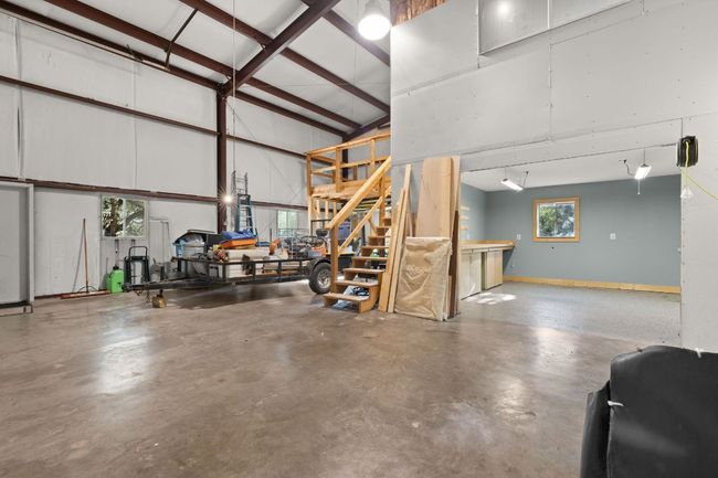 Giant 35 x50 garage/ workshop with upstairs office and additional covered parking | Image 32