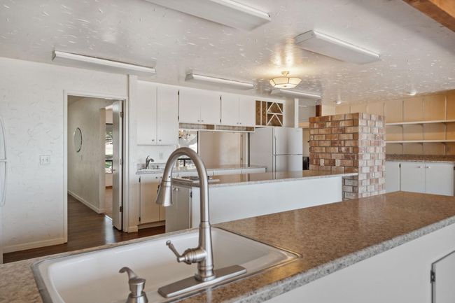 Kitchen, Dining Room Pass-Through & Entry to Den off of Kitchen | Image 19