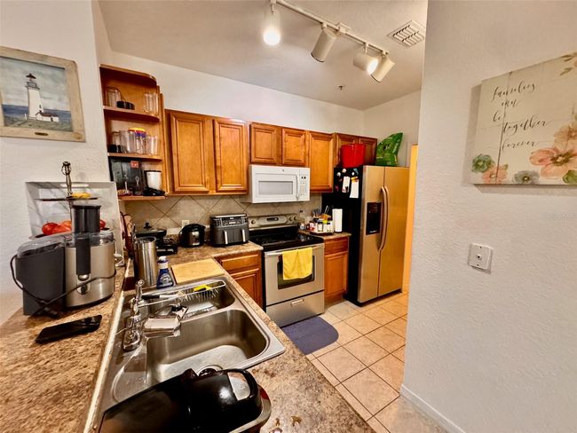 UNIT-303 - 6177 Metrowest Blvd, Condo with 2 bedrooms, 2 bathrooms and null parking in ORLANDO FL | Image 7