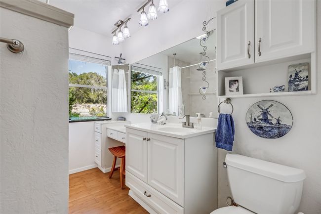 Conveniently located beween the 2nd and 3rd bedrooms is this light and bright Full Bath with a Rain Shower. | Image 31