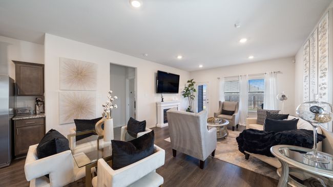 Living room with dark wood finished floors and recessed lighting | Image 11
