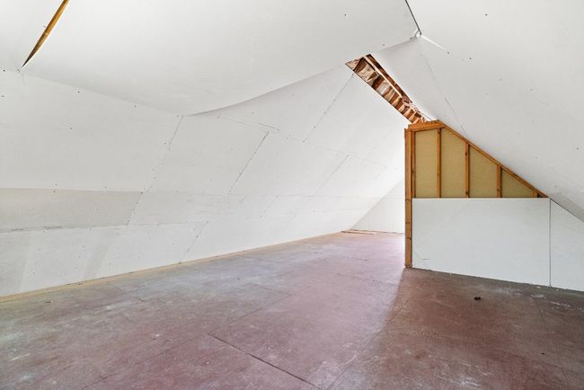 Bonus room featuring vaulted ceiling | Image 33