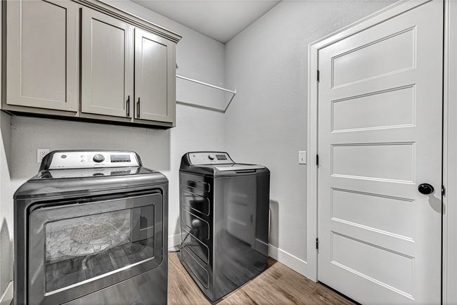 Third bedroom upstairs is very comfy with plenty of room for a full size bed and chest of drawers. | Image 24