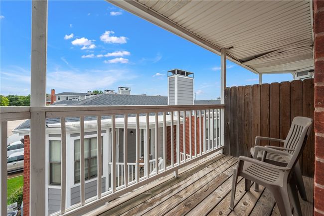 View of balcony off the bedroom, overlooking the courtyard | Image 10