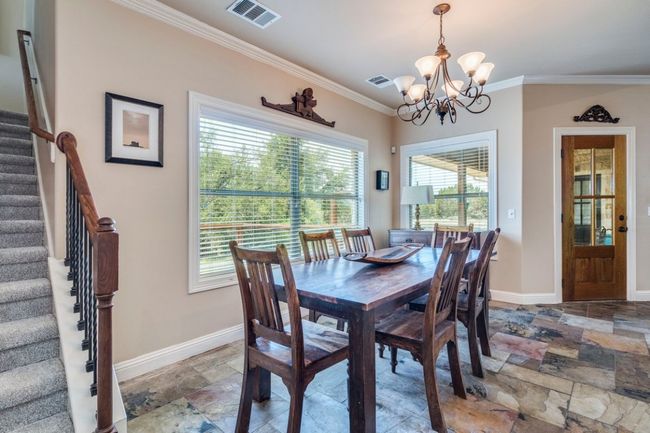 Dining area off of kitchen with more views! | Image 12