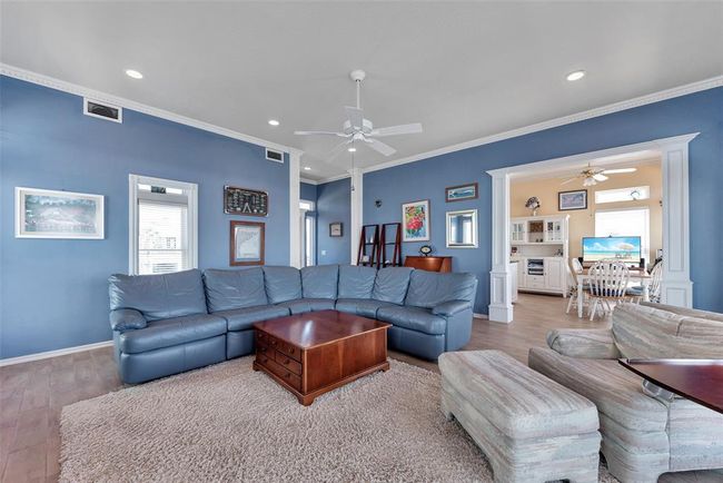 Spacious and Versatile – This large main living area offers flexible layout options with room for oversized furniture, display space for art or shelving, and smooth flow into the adjacent dining and kitchen areas. Ideal for everyday comfort and easy entertaining. | Image 7