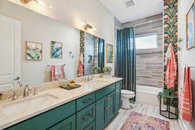 Bathroom with shower / bath combo and double vanity | Image 26