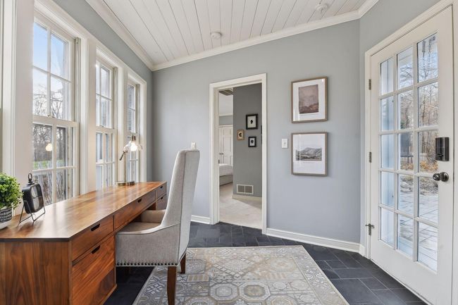 Breezway office with heated tile floors and an abundance of natural light. | Image 12