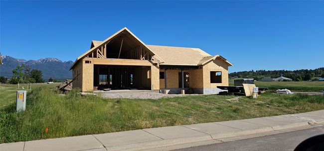 View of front of house with a mountain view and a front lawn | Image 21