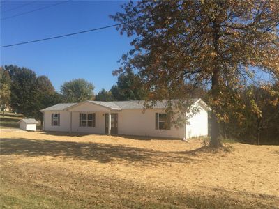 front of home | Image 1