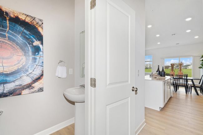 (Photo of decorated model, actual home's finishes will vary) A powder bath just off of the main level for ultimate convenience. | Image 19