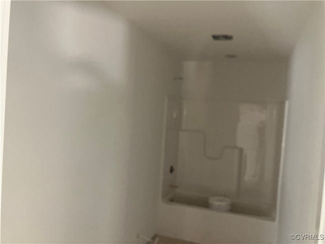 Bathroom featuring a shower | Image 24