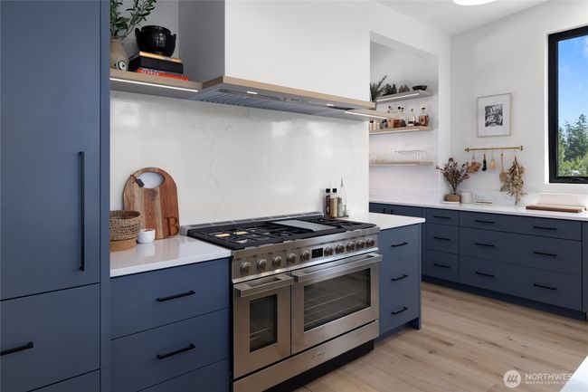 Paneled Liebherr fridge and dual Smeg range. | Image 9