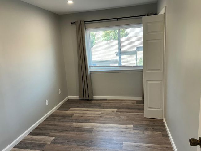 Spare room featuring baseboards, recessed lighting, and wood finished floors | Image 40