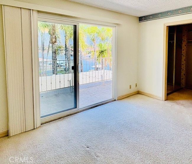 Primary bedroom has great view off balcony | Image 32