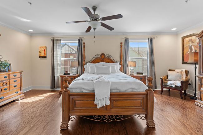 Continue upstairs to the spacious owner's suite! | Image 12