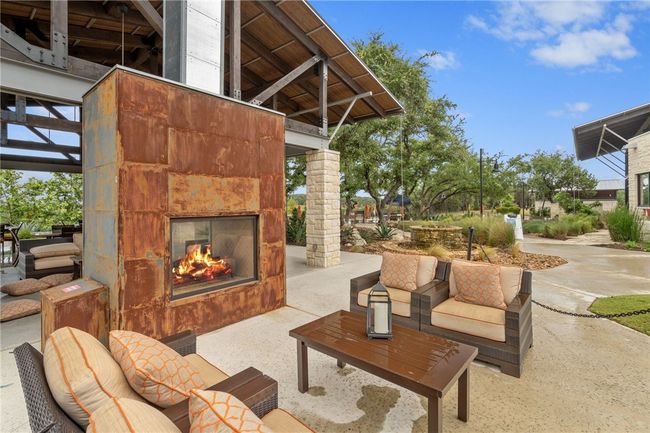 Get cozy by the fire place at the amenity center! | Image 32