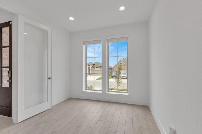 Spare room with light wood-style floors and recessed lighting | Image 7