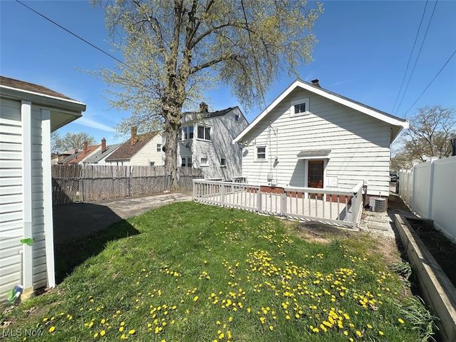 Back of property with a yard and a fenced backyard | Image 15