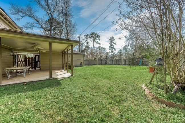 Expansive backyard space, perfect for any needs. | Image 40