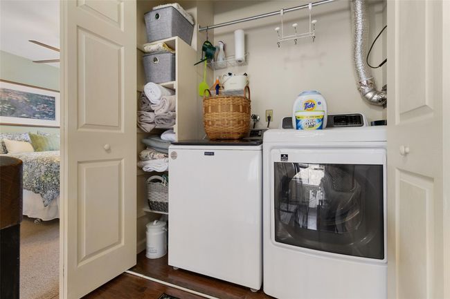 Laundry area adjacent to primary bedroom | Image 14