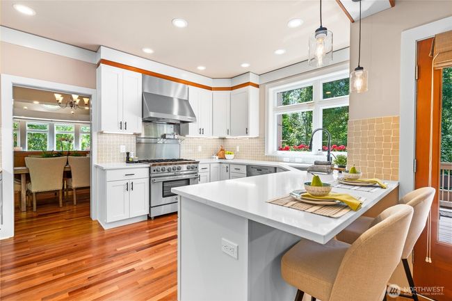 Beautiful Modern Kitchen w White Cabinets, Wolfe Gas Range, Theradore appliances | Image 17