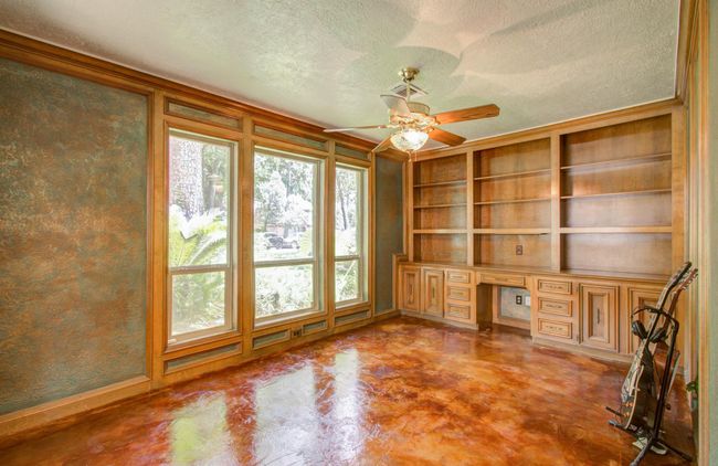 Office with solid wood built-ins. | Image 15
