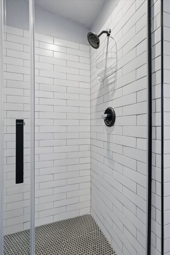 Bathroom with a shower stall | Image 22