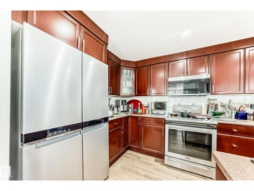 305-10028 119 St Nw, Edmonton, AB, T5K1Y8 | Card Image