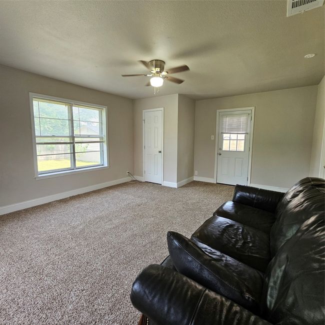 Huge flex space ready for you to use as a bedroom, 2nd living room or media room. | Image 13