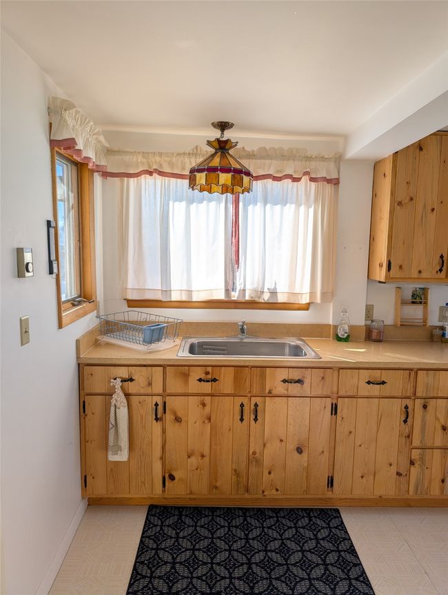 Kitchen featuring sink | Image 4