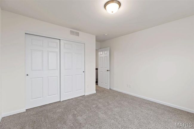 Unfurnished bedroom featuring carpet flooring and a closet | Image 24