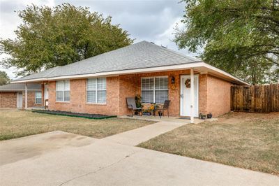 View of front of property with a front lawn | Image 1