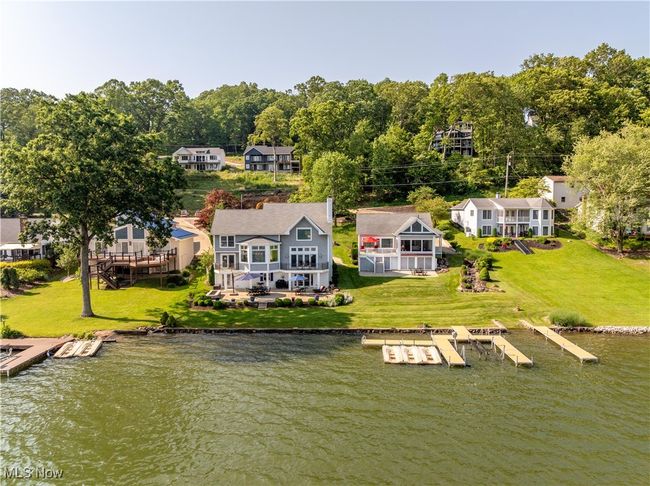 View from above of property with a nearby body of water | Image 18