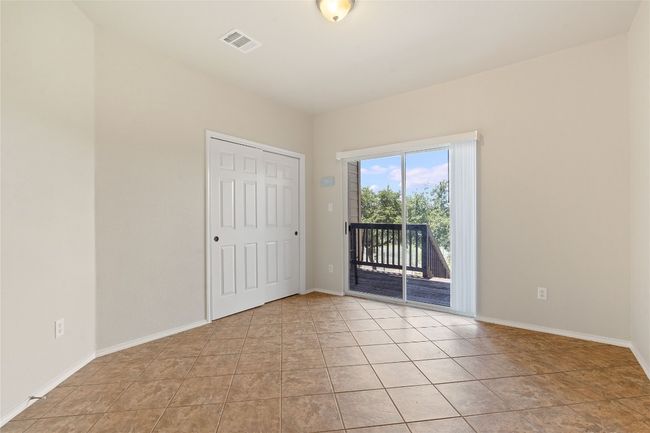 Unfurnished room with baseboards, visible vents, and light tile patterned floors | Image 18